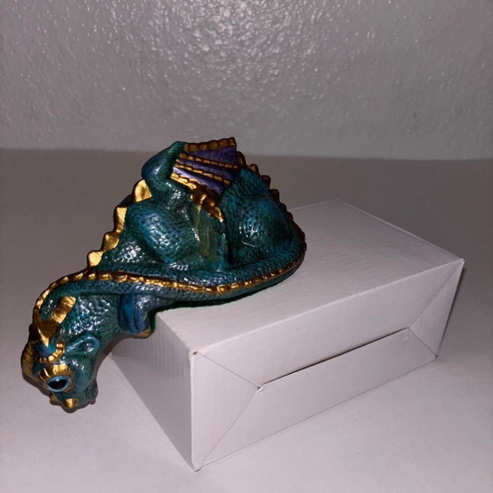 Handmade Ceramic Dragon- looking down over the edge